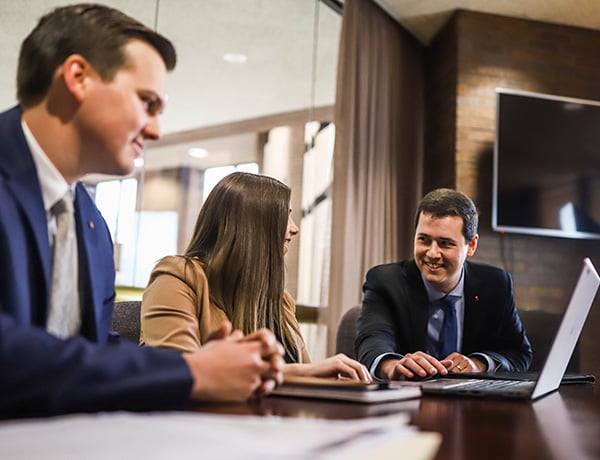 Image of First Financial employees in a board room