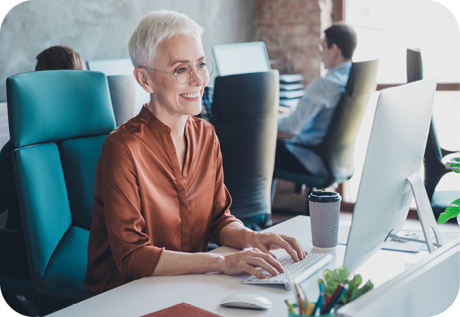 Mature professional woman on a computer
