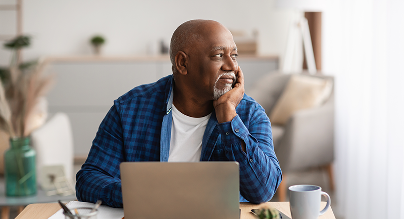 Elderly man on laptop