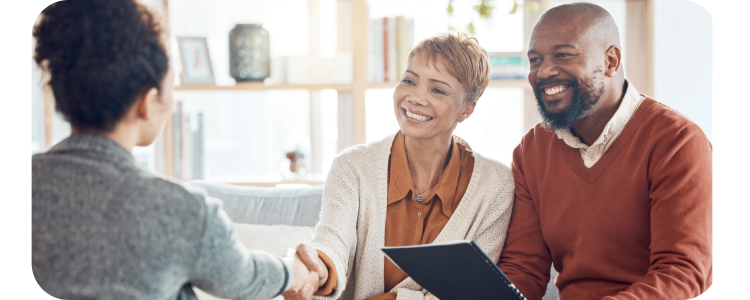 Photo of a couple meeting with a business woman